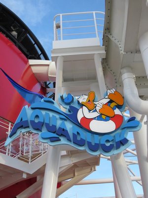 AquaDuck sign with Donald Duck beside a Disney Dream funnel
