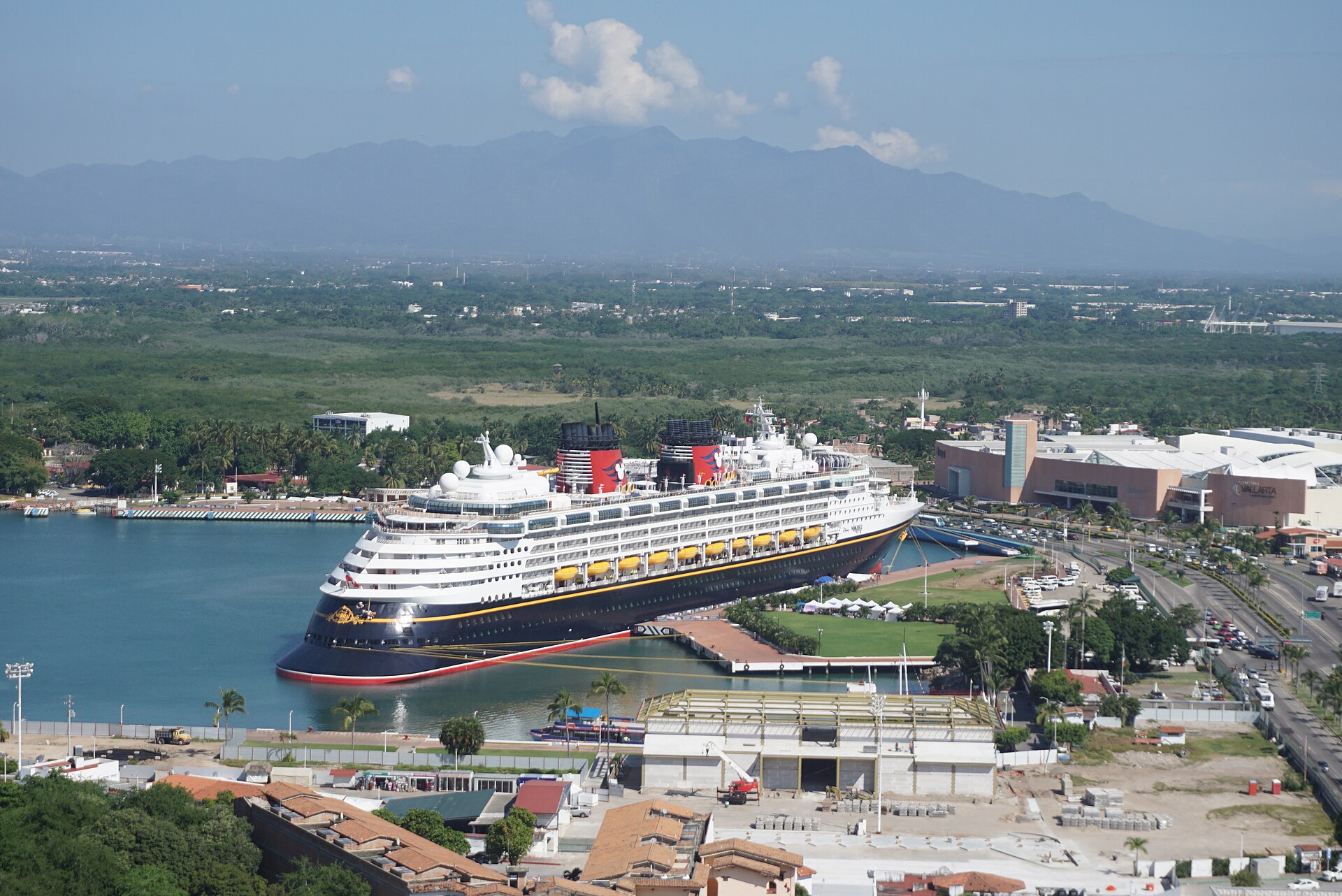Disney Wonder docked at Puerto Vallarta with the coastal mountains behind it